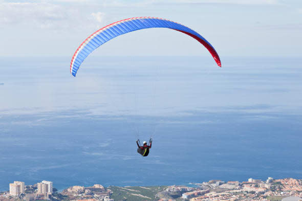 Competitors flying above the coast at the  Open International Parascending Competition in Adeje, Tenerife, Canary Islands. 6th t