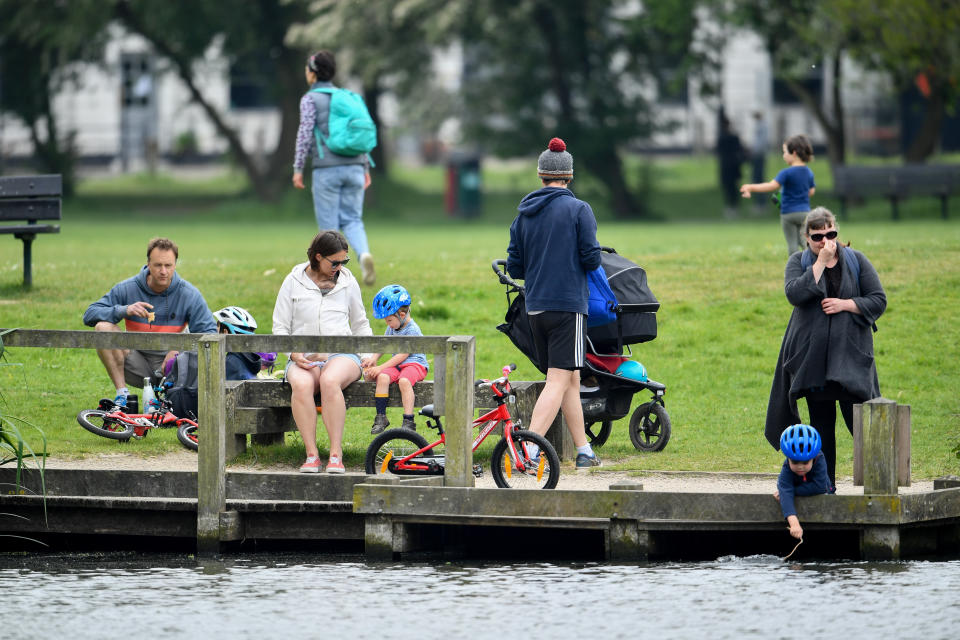 People take their exercise on Wandsworth Common as the UK continues in lockdown to help curb the spread of the coronavirus.