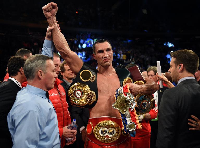 Wladimir Klitschko of Ukraine celebrates his win over Bryant Jennings of the US, after their World Heavyweight Championship boxing bout, at Madison Square Garden in New York, on April 25, 2015