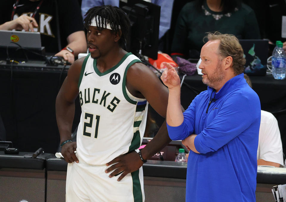 Bucks coach Mike Budenholzer must ask for more from Jrue Holiday. (Kevin C. Cox/Getty Images)