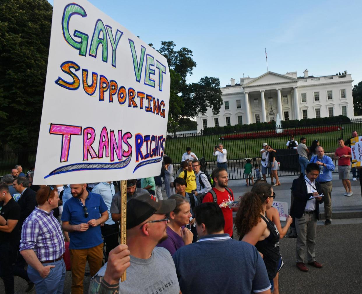 Protesters gather in front of the White House after Donald Trump announces his ban on transgender troops: PAUL J. RICHARDS/AFP/Getty Images