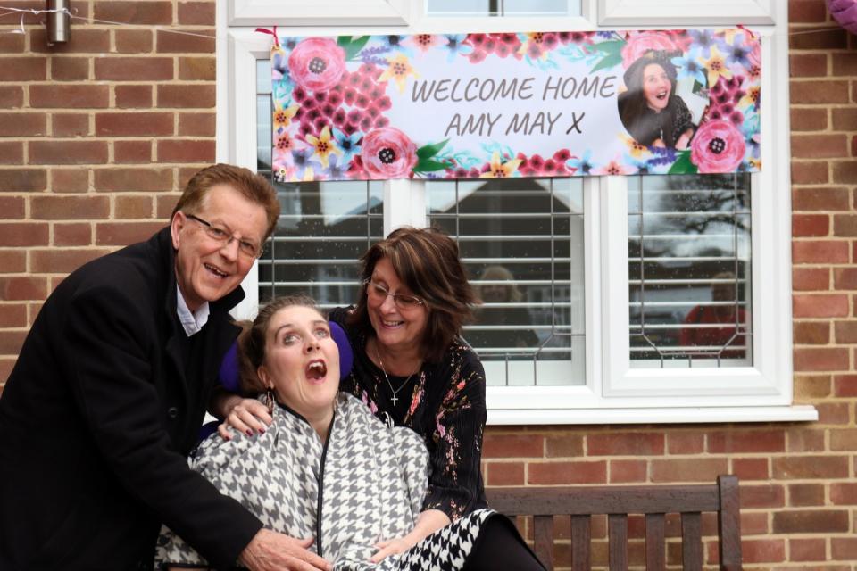 Amy May Shead, at home with her parents Roger and Sue (Amy May Trust)