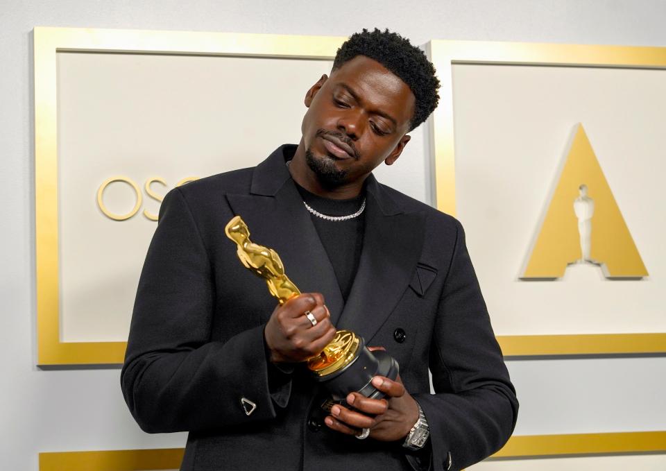 Daniel Kaluuya, winner best supporting actor winner for "Judas and the Black Messiah," poses in the press room during the Oscars.