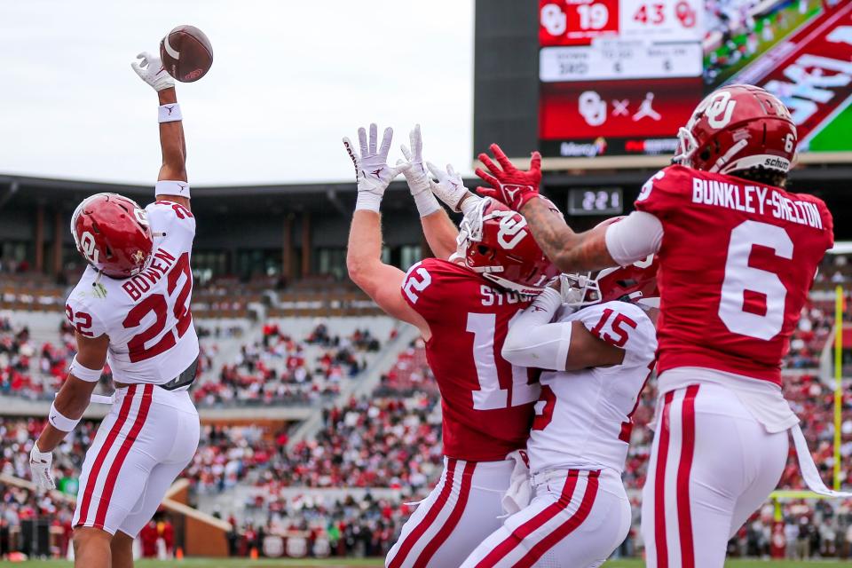 OU defensive back Peyton Bowen (22) breaks up a pass during Saturday's Red-White spring football game at Gaylord Family-Oklahoma Memorial Stadium in Norman.