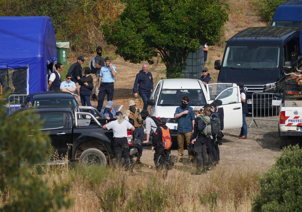 Personnel at Barragem do Arade reservoir, in the Algave, Portugal, as searches begin as part of the investigation into the disappearance of Madeleine McCann. The area is around 50km from Praia da Luz where Madeleine went missing in 2007. Picture date: Tuesday May 23, 2023. PA Photo. See PA story POLICE Portugal. Photo credit should read: Yui Mok/PA Wire 
