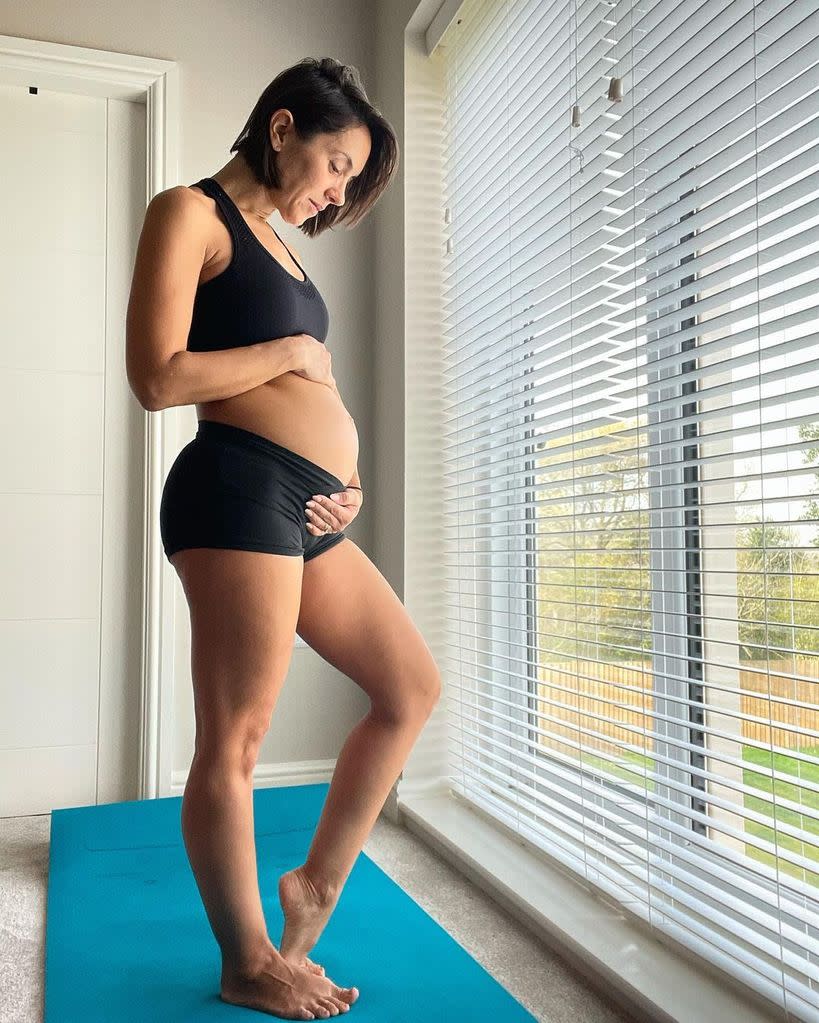 Janette Manrara cradling her baby bump