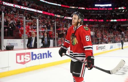 Chicago Blackhawks right wing Patrick Kane (88) skates off the ice after game seven of the Western Conference Final of the 2014 Stanley Cup Playoffs against the Los Angeles Kings at United Center. Jun 1, 2014; Chicago,USA;: Jerry Lai-USA TODAY Sports