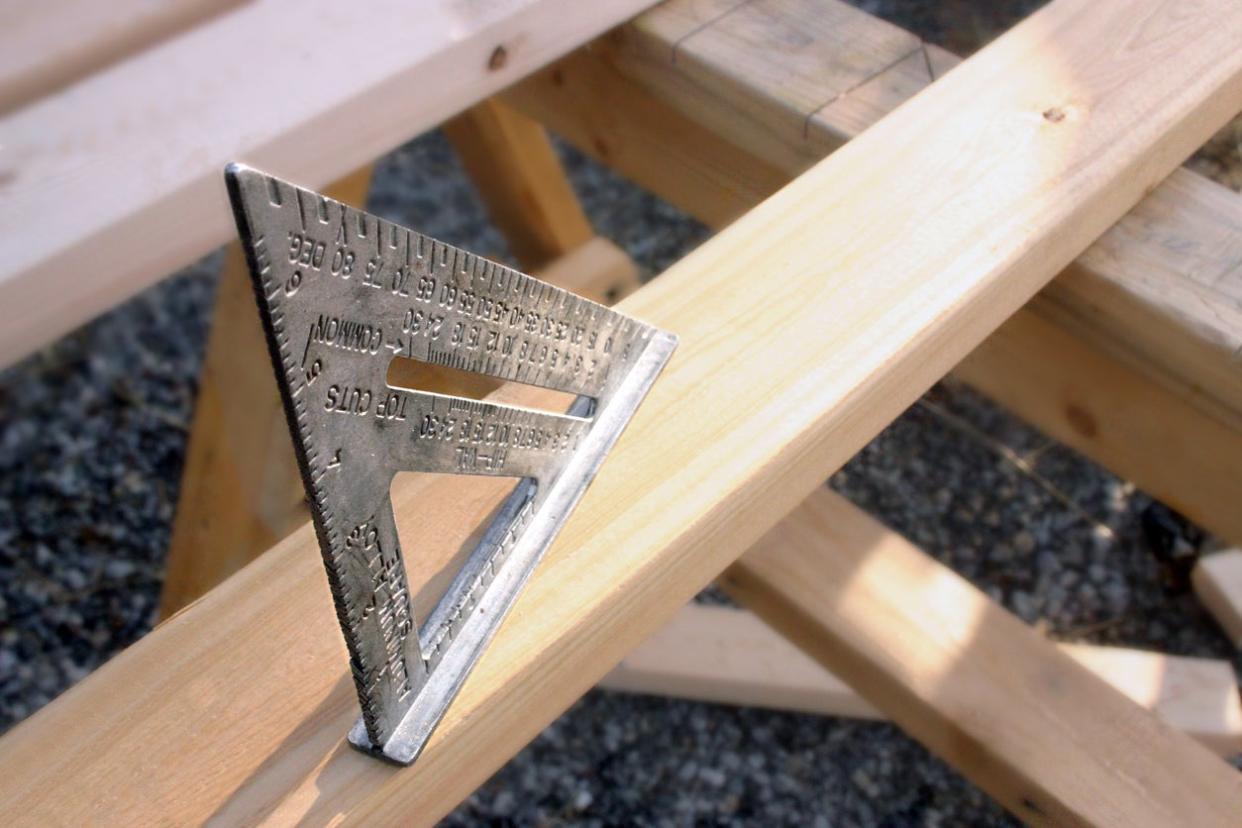 Speed square on a wooden sawhorse