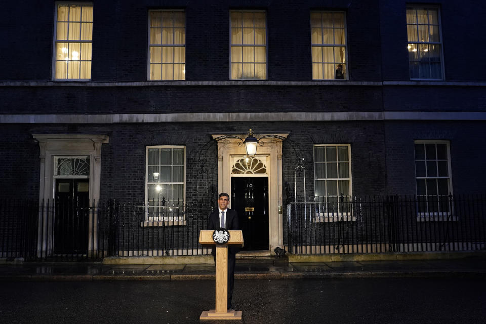 Britain's Prime Minister Rishi Sunak addresses the media at Downing Street in London, Friday, March 1, 2023. The Prime Minister used the address to warn that democracy is being targeted by extremists. (AP Photo/Alberto Pezzali)