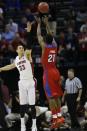 Dayton forward Dyshawn Pierre (21) shoots against Stanford forward Dwight Powell (33) during the first half in a regional semifinal game at the NCAA college basketball tournament, Thursday, March 27, 2014, in Memphis, Tenn. (AP Photo/John Bazemore)