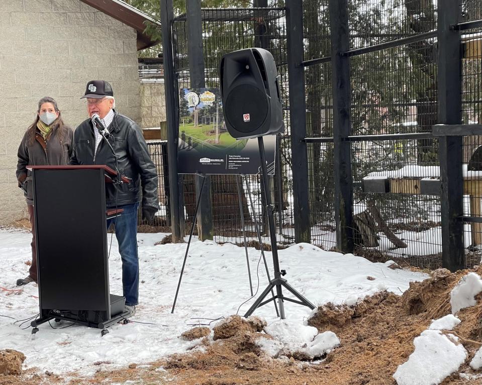 Lee Anderson of Rockland speaks outside the snow leopard exhibit during a groundbreaking ceremony Monday at NEW Zoo & Adventure Park in Suamico. He and has wife Kathy are the lead donors for a new building for that exhibit as well as an expansion to the giraffe building.