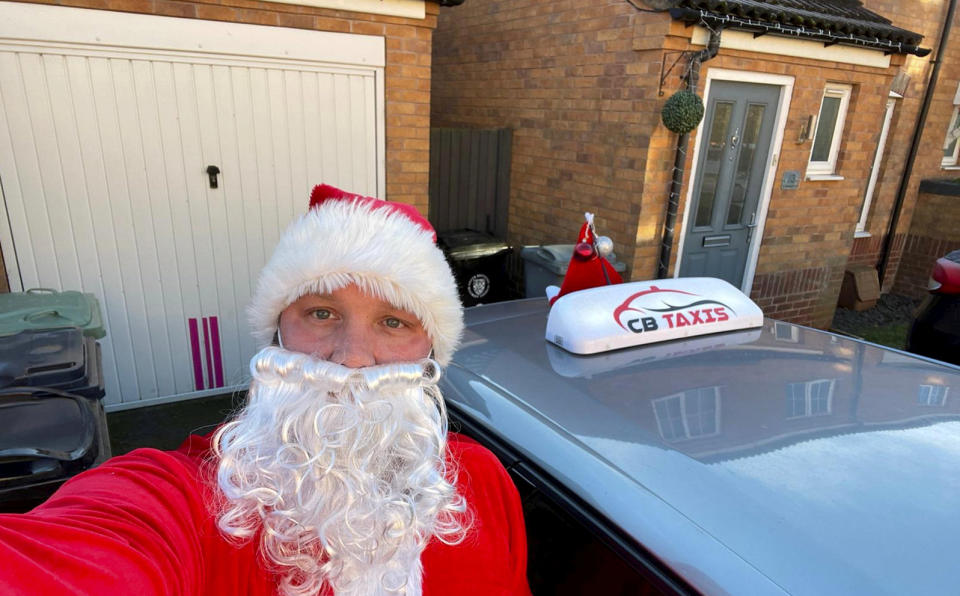 Brian Makwana, 37, has been dressing up as Santa Claus to spread festive cheer. (SWNS)
