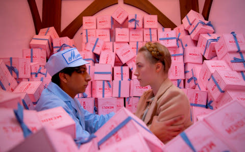 Tony Revolori and Saiorse Ronan in The Grand Budapest Hotel