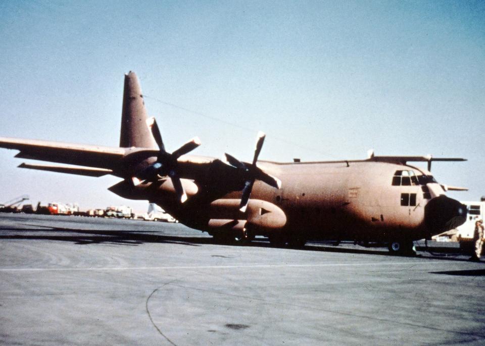 A poor-quality but rare photo of a U.K. Royal Air Force C-130K Hercules in desert camouflage during the Gulf War in 1991. <em>Crown Copyright</em>