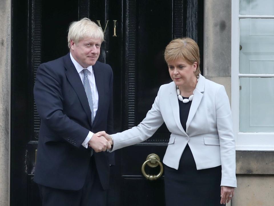 Nicola Sturgeon with Boris Johnson at Bute House in 2019PA