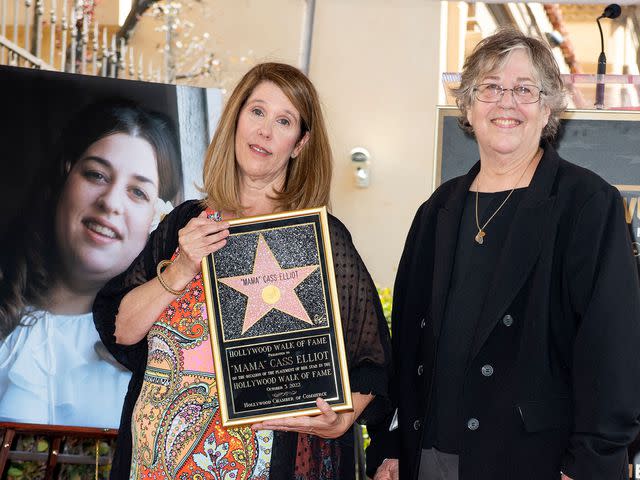<p>VALERIE MACON/AFP/Getty</p> Owen Elliot-Kugell and Leah Kunkel attend a ceremony for "Mama" Cass Elliot's posthumous star on the Hollywood Walk of Fame on October 3, 2022.
