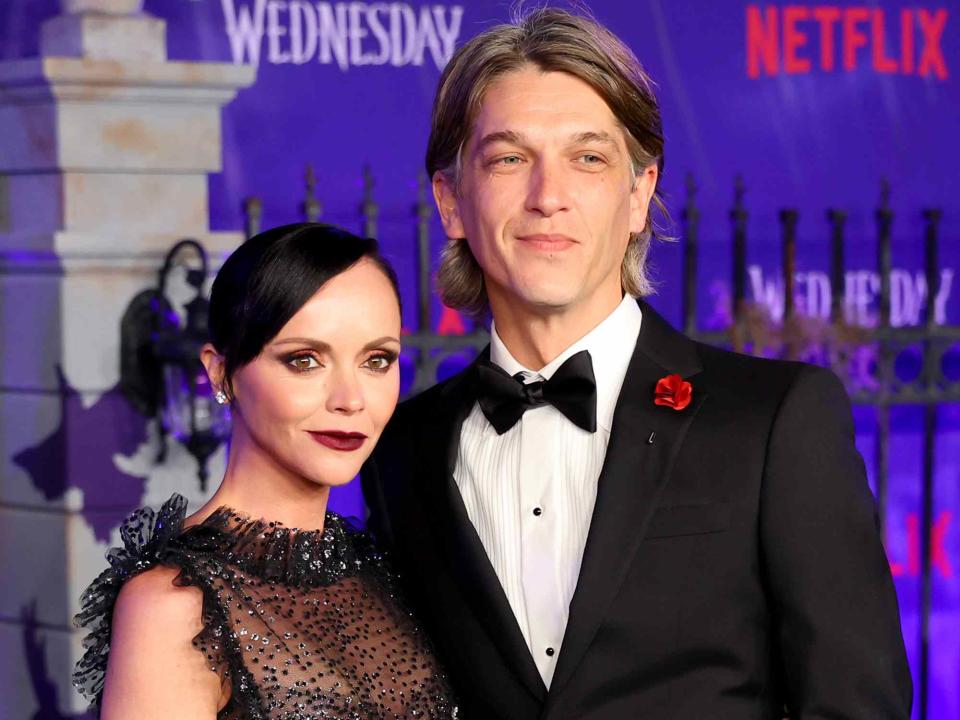 <p>Leon Bennett/Getty</p> Christina Ricci and Mark Hampton attend the world premiere of Netflix