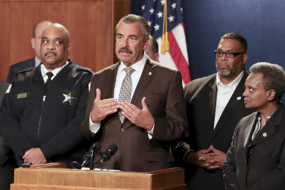 Former Los Angeles police Chief Charlie Beck speaks at a news conference after being named Chicago's interim police superintendent by Chicago Mayor Lori Lightfoot, right, on Friday, Nov. 8, 2019, in Chicago. The announcement comes a day after Superintendent Eddie Johnson, second from left, announced his retirement after more than three years as the city's police chief and more than 30 years with the department. (AP Photo/Teresa Crawford)