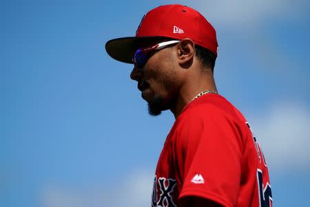 FILE PHOTO: Mar 10, 2019; Port Charlotte, FL, USA; Boston Red Sox right fielder Mookie Betts (50) takes the field prior to a game against the Tampa Bay Rays at Charlotte Sports Park. Mandatory Credit: Aaron Doster-USA TODAY Sports