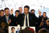 Conservative independent candidate Peter Marki-Zay celebrates in Budapest, Hungary, Sunday, Oct. 17, 2021, after he won an opposition primary race in Hungary, making him nominee of a six-party opposition coalition who will lead a challenge to right-wing populist Prime Minister Viktor Orban in national elections next spring . (AP Photo/Laszlo Balogh)