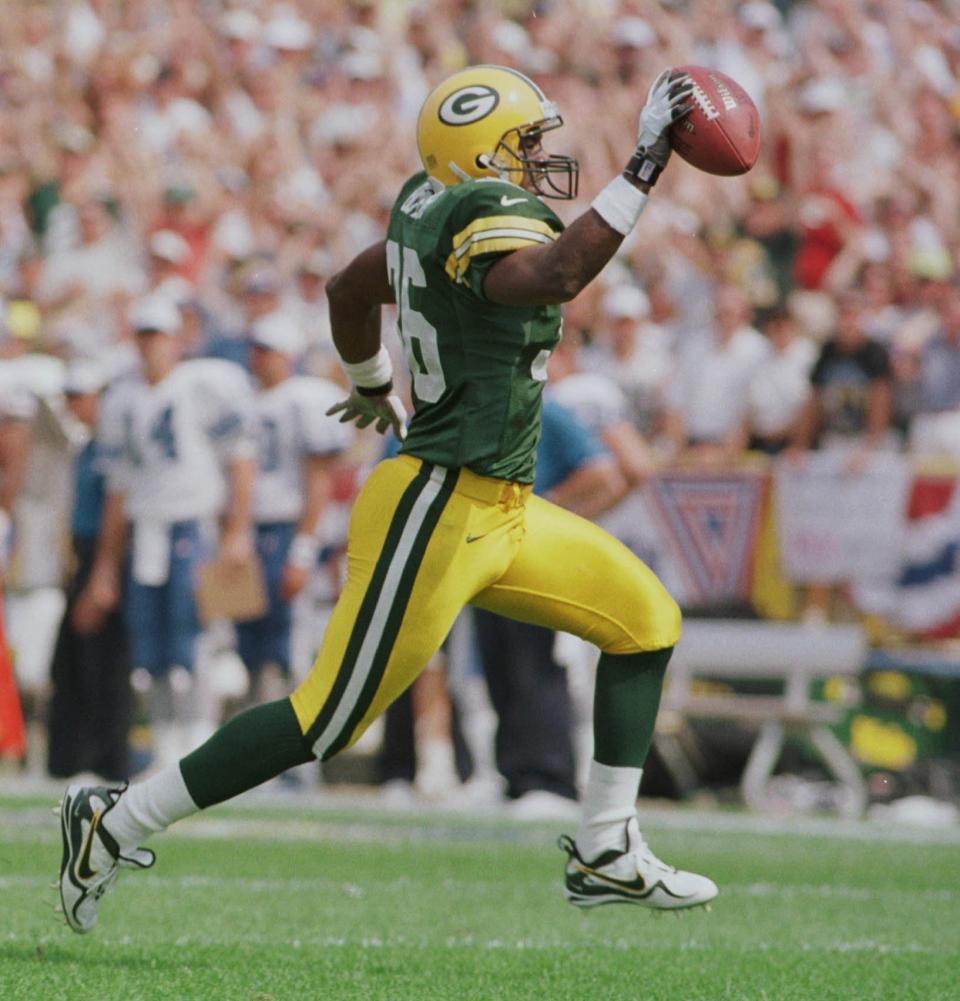 LeRoy Butler is on his way to a touchdown after recovering a Lions fumble during a Sept. 6, 1998, game at Lambeau Field.