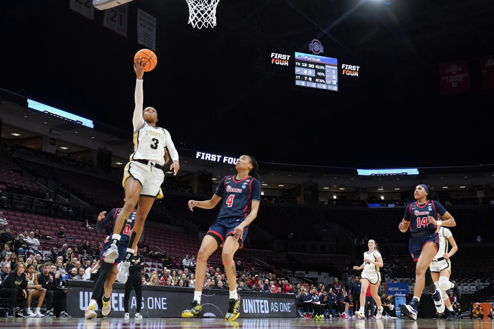 Purdue guard Jayla Smith (3) drives on St. John's guard Jayla Everett (4) in the second half of a First Four women's college basketball game in the NCAA Tournament Thursday, March 16, 2023, in Columbus, Ohio. (AP Photo/Paul Sancya)
