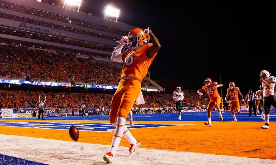 In this file photo, Boise State wide receiver John Hightower flexes in the end zone after running 98 yards on the Broncos’ first kickoff return against Portland State at Albertsons Stadium in Boise.