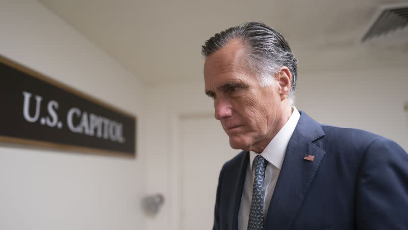 Sen. Mitt Romney, R-Utah, a member of the Senate Foreign Relations Committee, heads to a vote before a national security briefing on Ukraine, at the Capitol in Washington, on March 16, 2022.