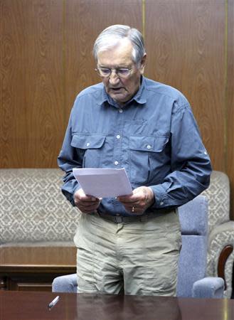 U.S. citizen Merrill E. Newman reads from a piece of paper at an undisclosed location in this undated photo released by North Korea's Korean Central News Agency (KCNA) in Pyongyang on November 30, 2013. North Korea said on Saturday it had arrested Newman for "hostile acts" against the state and accused him of being "a criminal" who was involved in the killing of civilians during the 1950-53 Korean War. REUTERS/KCNA