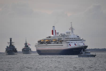 The MV Boudicca, carrying veterans, leaves the harbour in Portsmouth