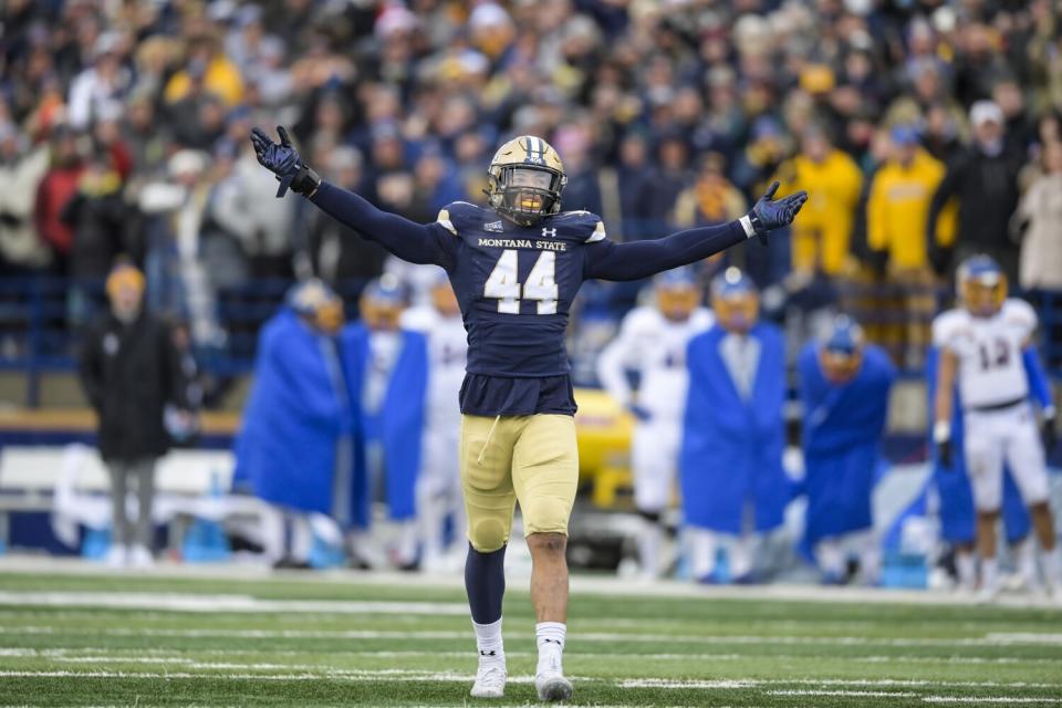 Montana State's Daniel Hardy (44) gestures to the crowd during the semifinals of the FCS playoffs.