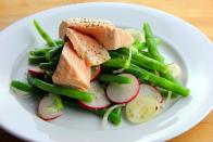 <p>When paired with lemon slices, herbs, and wine or broth in place of water, this salmon will only smell of delicious aromatics. You can add these silky, tender bites of salmon <a href="https://www.goodhousekeeping.com/food-recipes/healthy/g180/healthy-salads/" rel="nofollow noopener" target="_blank" data-ylk="slk:into a quick salad;elm:context_link;itc:0;sec:content-canvas" class="link ">into a quick salad</a> or even atop cold noodles. Got 8 minutes? You have perfectly poached salmon!</p><p><em><a href="https://www.goodhousekeeping.com/food-recipes/a10196/micro-poached-salmon-recipe-ghk0610/?click=recipe_sr" rel="nofollow noopener" target="_blank" data-ylk="slk:Get the recipe for Micro-Poached Salmon;elm:context_link;itc:0;sec:content-canvas" class="link ">Get the recipe for Micro-Poached Salmon</a> »</em></p>