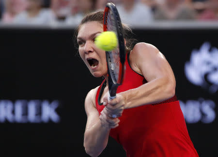 Tennis - Australian Open - Margaret Court Arena, Melbourne, Australia, January 18, 2018. Romania's Simona Halep in action during her match against Canada's Eugenie Bouchard. REUTERS/Issei Kato