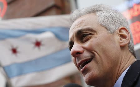 Chicago Mayor Rahm Emanuel speaks to the media after a campaign stop on election day in Chicago, Illinois, February 24, 2015. REUTERS/Jim Young