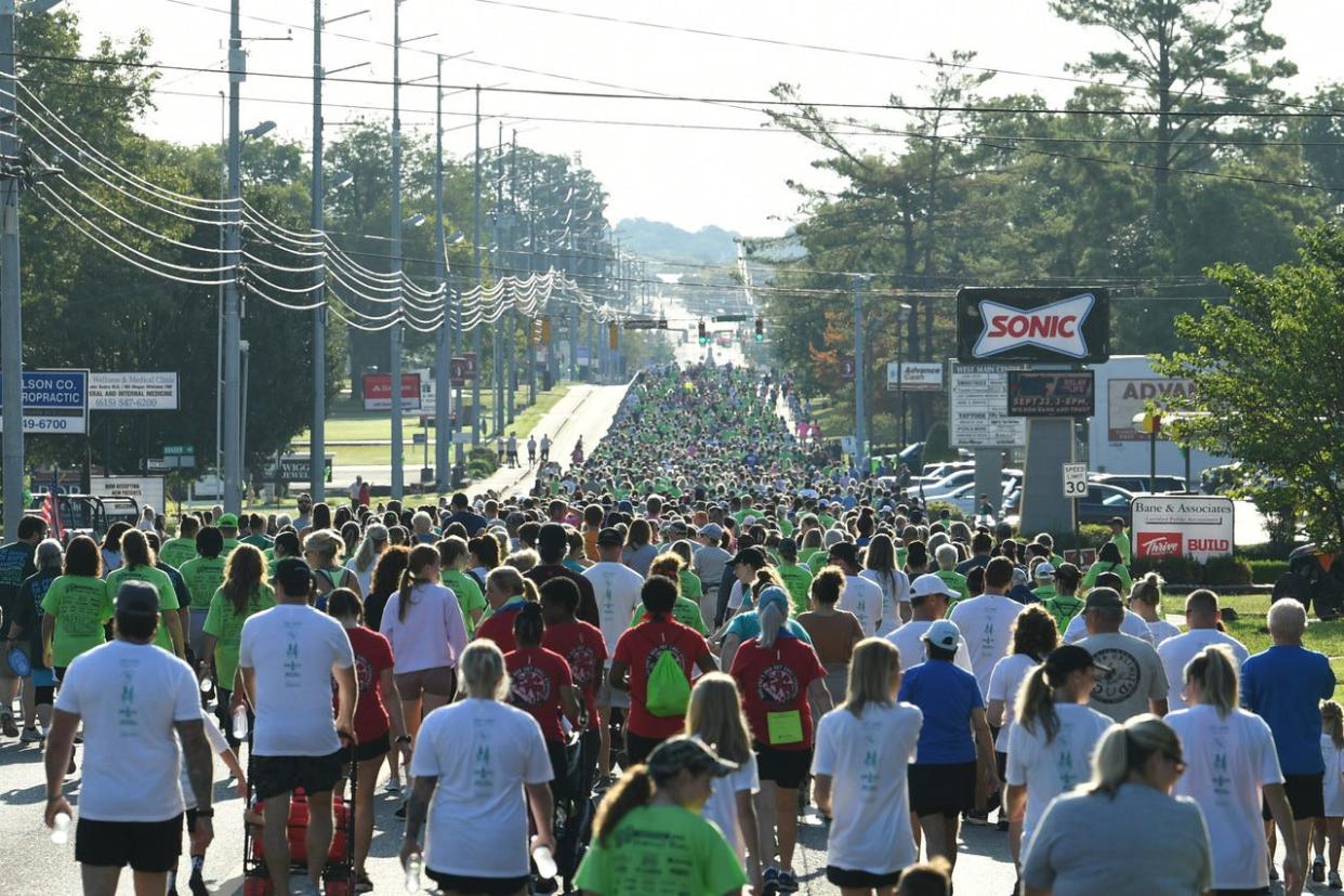 Participants in the 2023 Sherry's Run 5K Walk-Run flooding Lebanon streets.