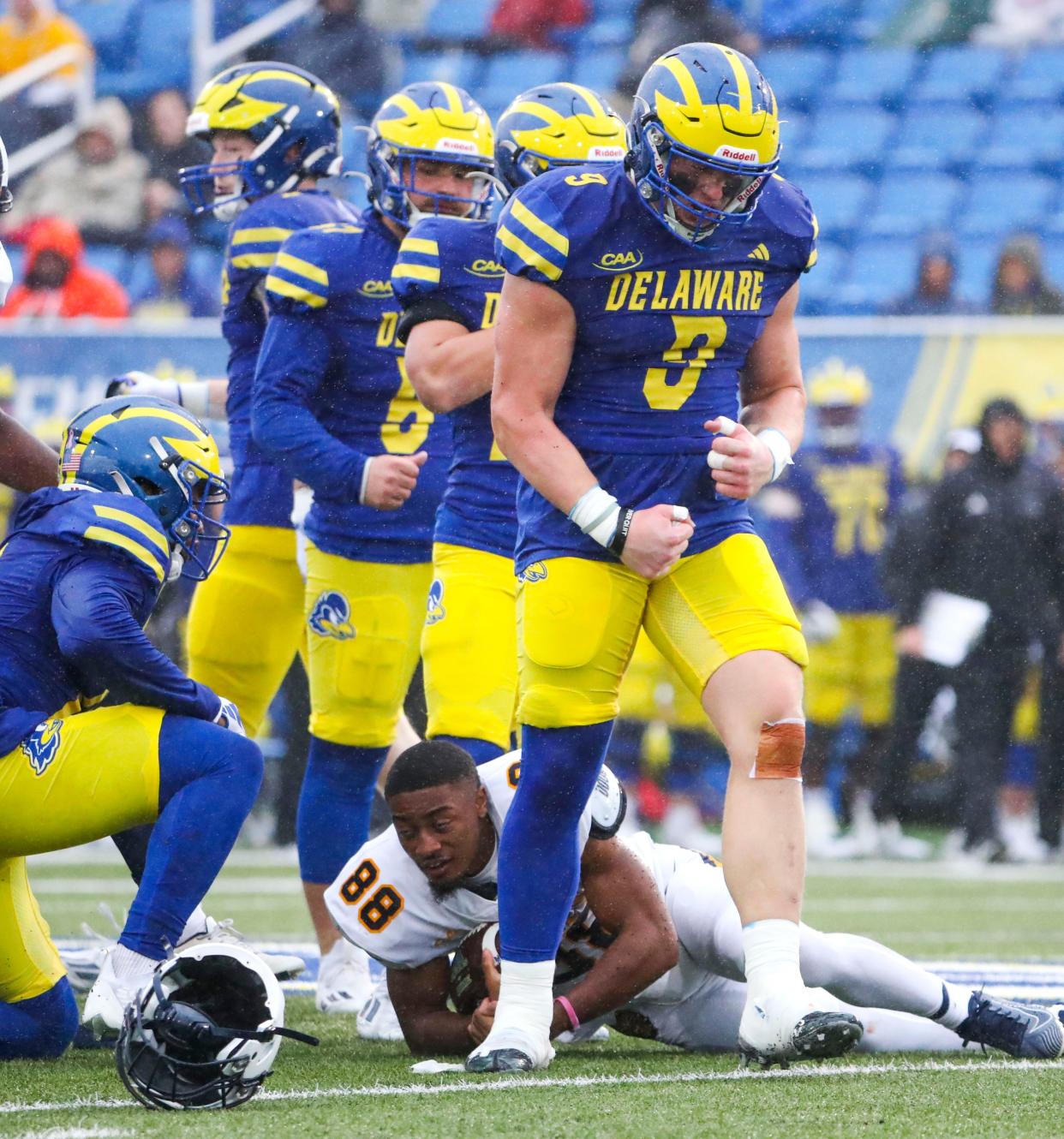Delaware tight end Braden Brose reacts after helping finish a tackle on North Carolina A&T punt returner Elijah Kennedy (88) in the first quarter at Delaware Stadium, Saturday, Oct. 14, 2023.