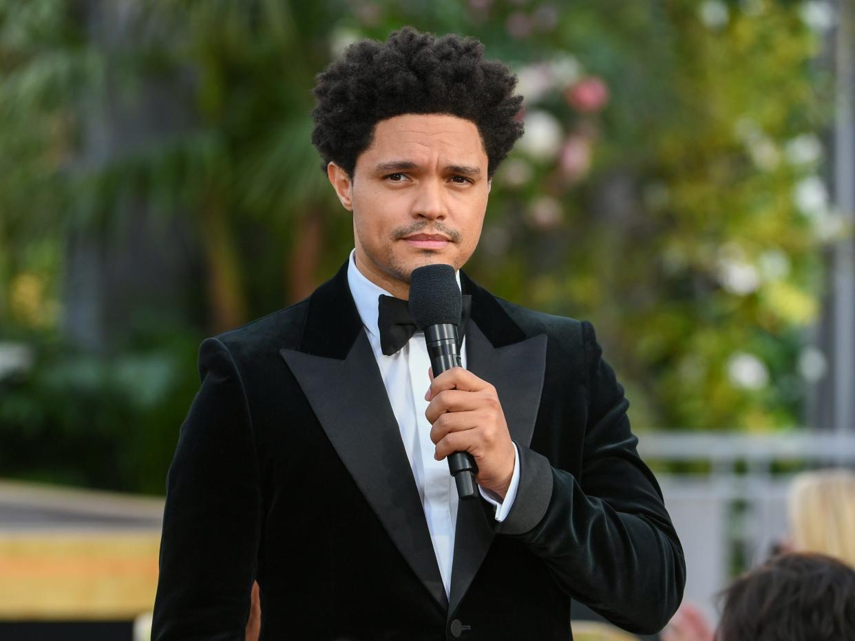 Trevor Noah speaks onstage during the 63rd Annual GRAMMY Awards at Los Angeles Convention Center .