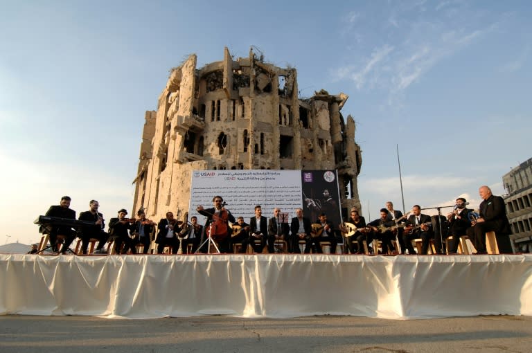 Renowned maestro Karim Wasfi performs alongside fellow Iraqi musicians in Mosul on November 10, 2018