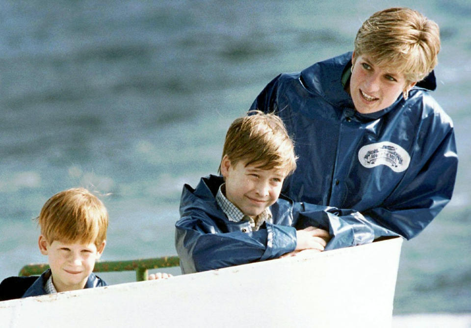 FILE - In this Oct. 1991 file photo, Britain's Diana, Princess of Wales, right, enjoys a boat ride on the Maid of Mist in Niagara Falls, Ont., Canada, with her sons Prince Harry, 7, and Prince William, 9. Princess Diana’s little boy, the devil-may-care red-haired prince with the charming smile is about to become a father. The arrival of the first child for Prince Harry and his wife Meghan will complete the transformation of Harry from troubled teen to family man, from source of concern to source of national pride. (Hans Deryk/Canadian Press via AP, File)