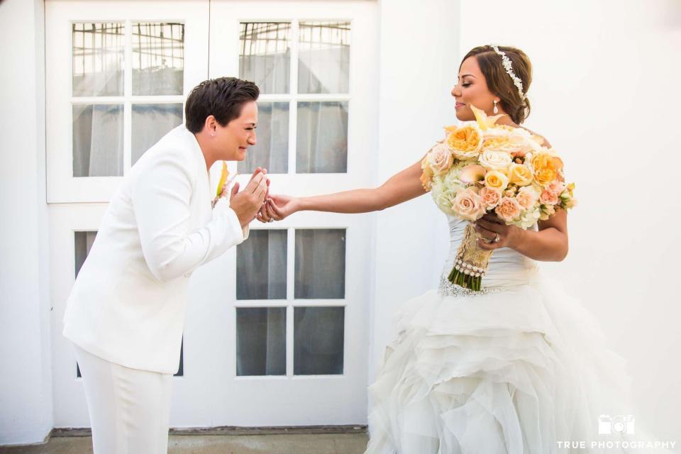 "This was the moment Kate turned around and saw Natasha in her dress for the first time. She was full of emotion to see her beautiful bride, and there truly wasn't a dry eye around!" -- <i>True Photography</i>