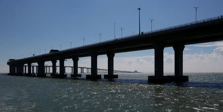 <p>A view of the Hong Kong-Zhuhai-Macau bridge off Lantau island in Hong Kong, China May 30, 2018. REUTERS/Bobby Yip </p>