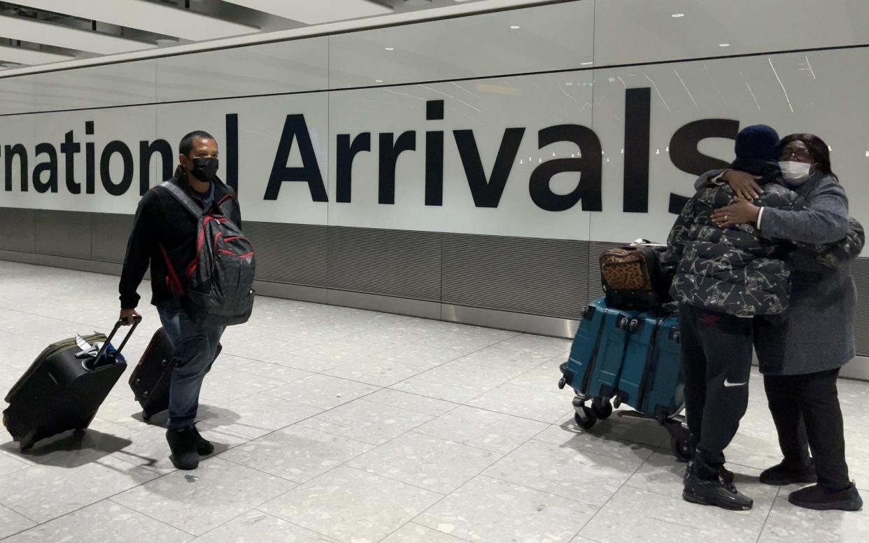 International passengers arrive at Heathrow Airport's Terminal 5 - Leon Neal/Getty Images