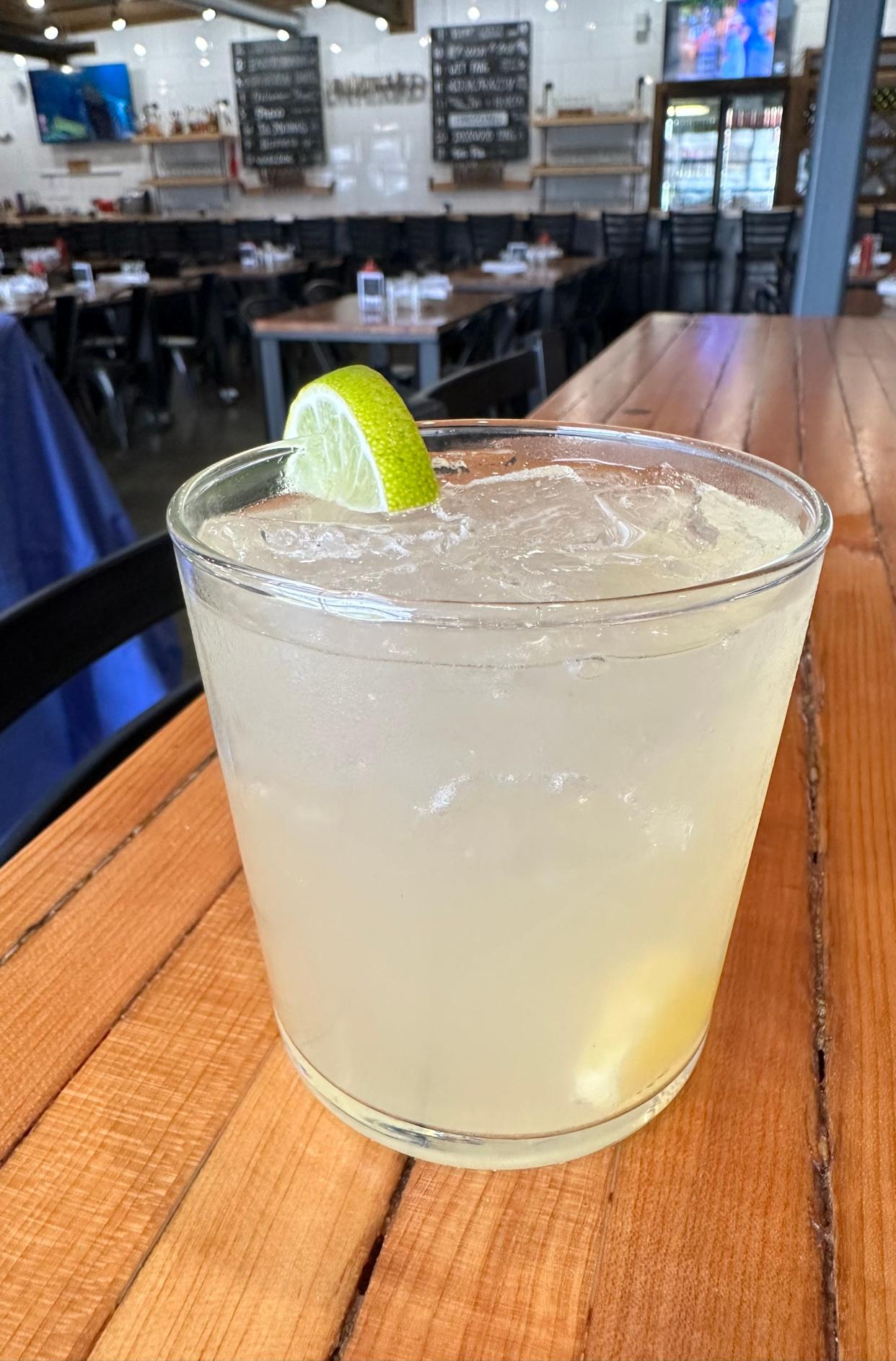 This refreshing pineapple green tea mule is the perfect almost-summer cocktail selection to enjoy with friends at UnHitched Brewing Co.