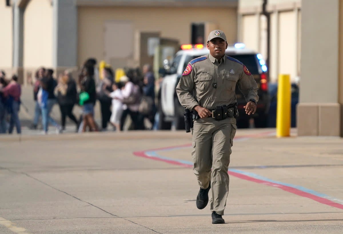 Police on the scene of the mass shooting at a mall in Allen (Copyright 2023 The Associated Press. All rights reserved.)