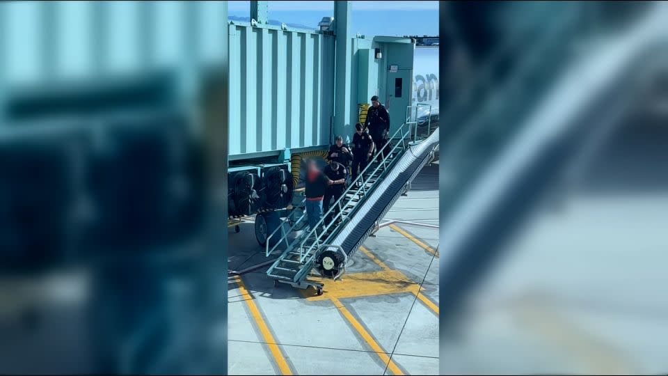 Video from the incident shows four police officers escorting someone from the plane. It’s not clear whether there was an arrest or if any charges are pending. - Layzdubz