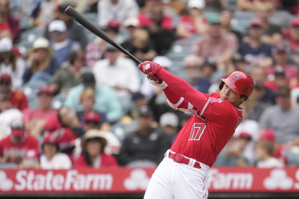 Los Angeles Angels' Shohei Ohtani connects for a single against the Miami Marlins during the fourth inning of a baseball game Sunday, May 28, 2023, in Anaheim, Calif. (AP Photo/Marcio Jose Sanchez)