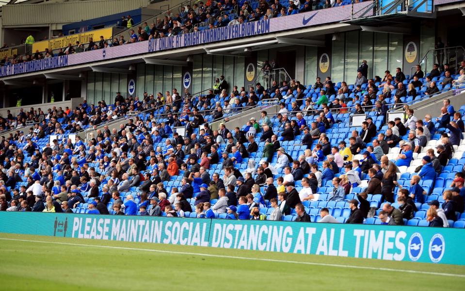 Amex Stadium — Government under pressure to reopen grounds earlier — on same date as shopping centres and pub gardens - PA