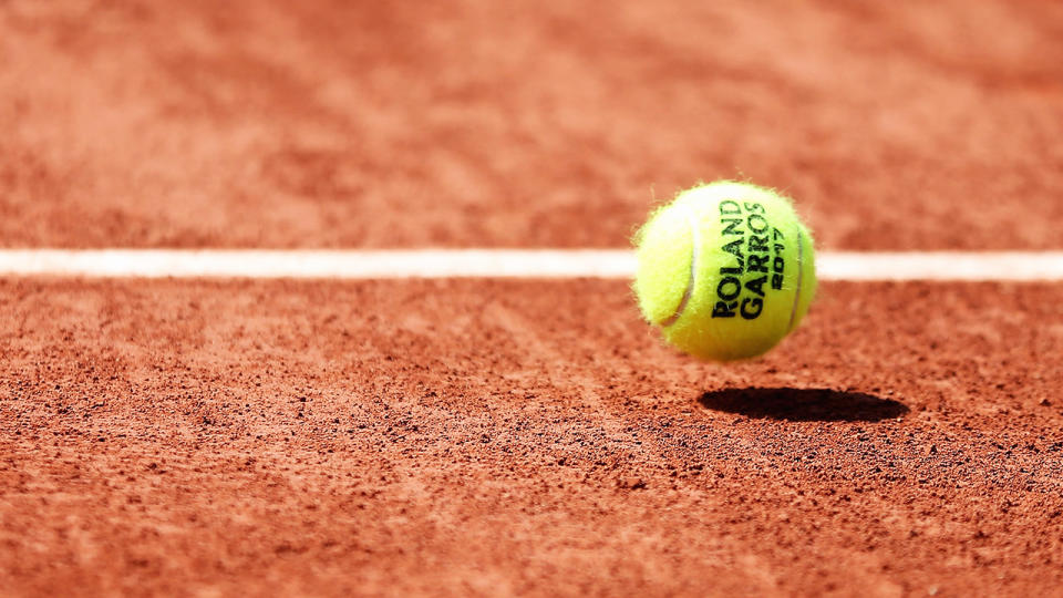 A French Open tennis ball, pictured here at Roland Garros.