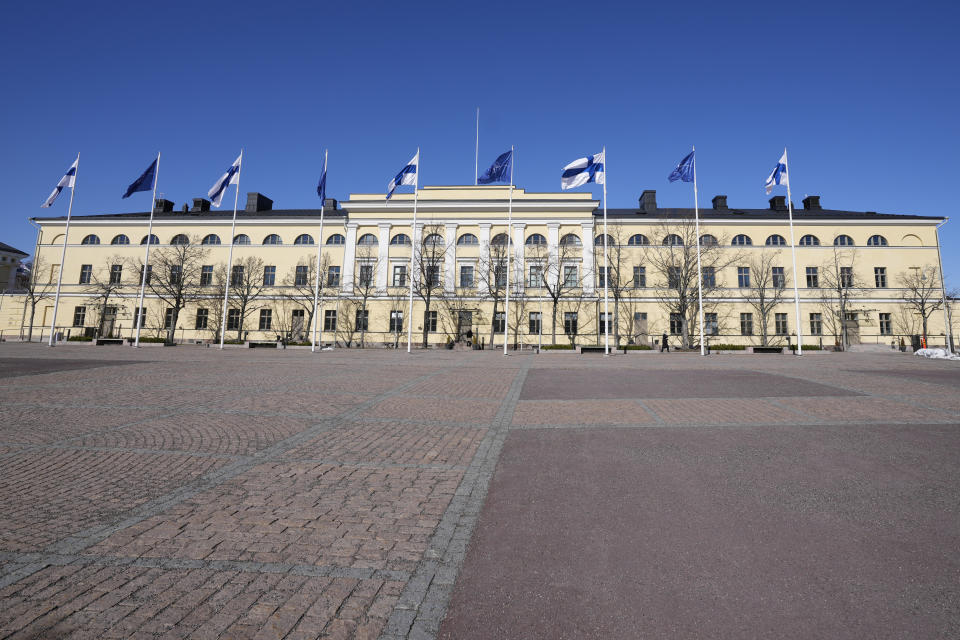 NATO and Finland flags flutter over the building of Ministry of Foreign Affairs in Helsinki, Finland, Tuesday, April 4, 2023. Finland prepared to make its historic entry into NATO Tuesday, a step that doubles the Western alliance’s border with Russia and ends decades of non-alignment for the Nordic nation. (AP Photo/Sergei Grits)