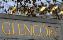 The logo of commodities trader Glencore is pictured in front of the company's headquarters in the Swiss town of Baar November 20, 2012. REUTERS/Arnd Wiegmann